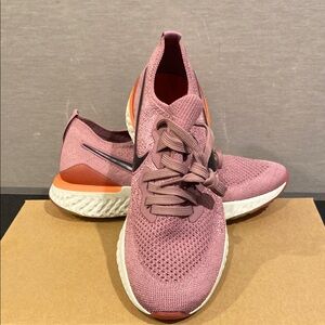 Nike Pink Athletic Running Shoes with Breathable Knit Fabric